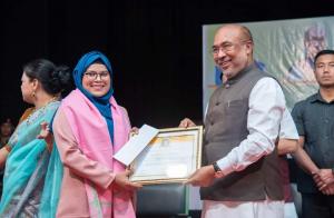 CM N. Biren Conferring Shusma Swaraj Award to Singamayum Tajbanu